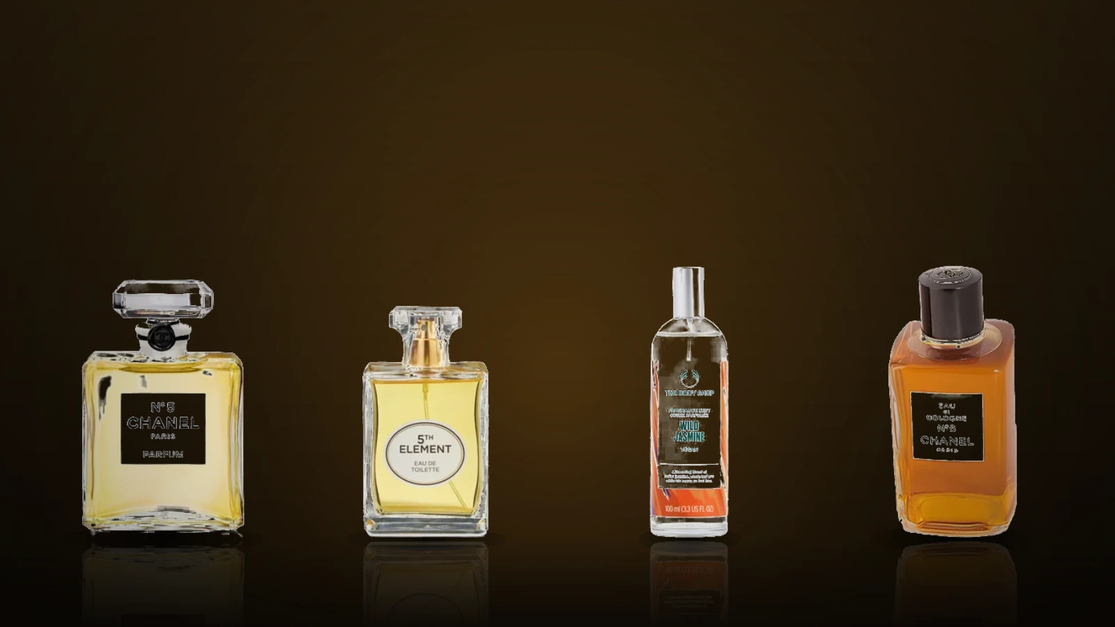 Several elegant perfume bottles with various labels and golden or black caps are arranged on a dark marble surface with soft lighting