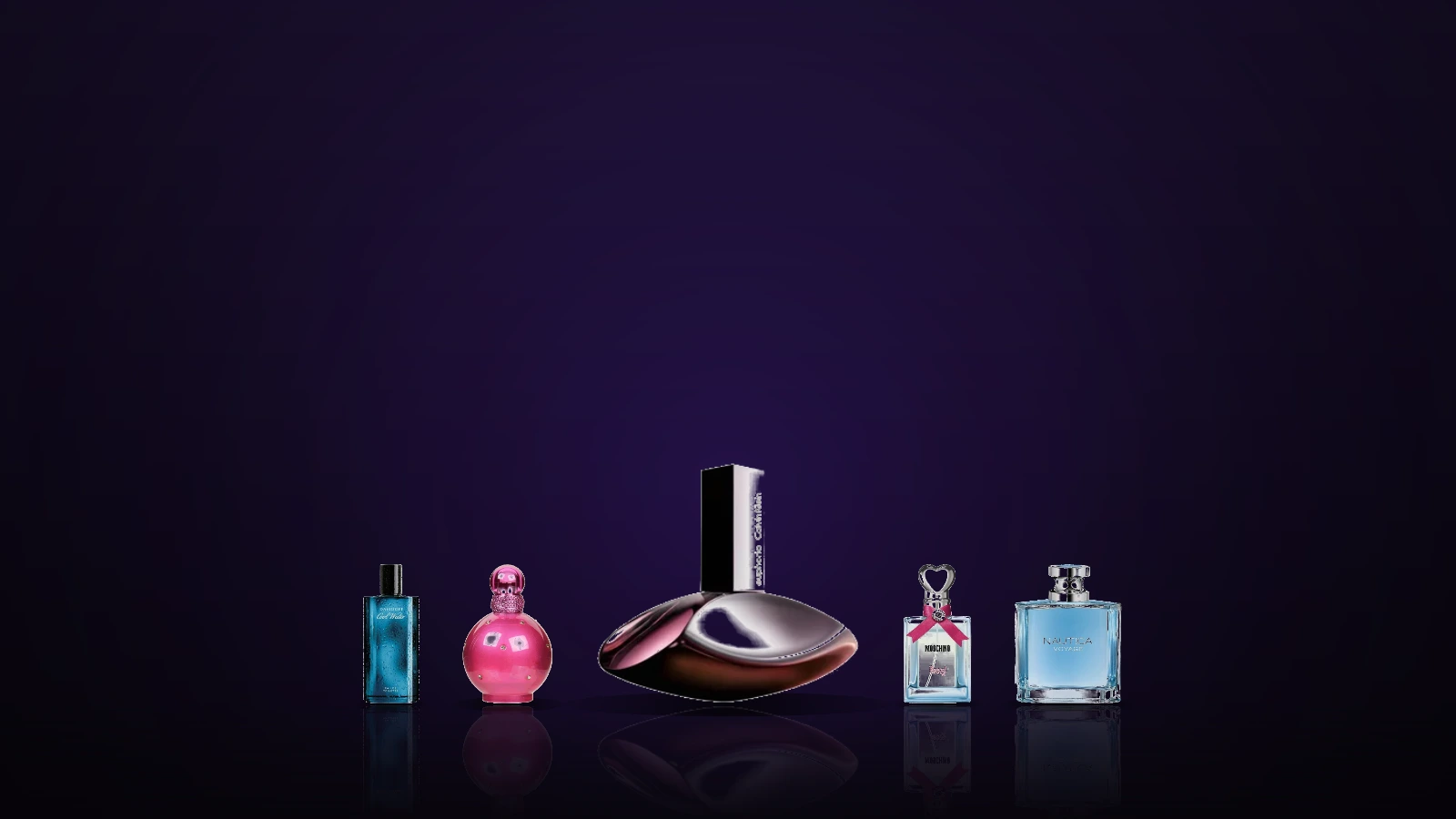 A flat-lay of well-known cheap perfume bottles including Davidoff Cool Water, Calvin Klein CK One, Nautica Voyage, Britney Spears Fantasy and Aquolina Pink Sugar