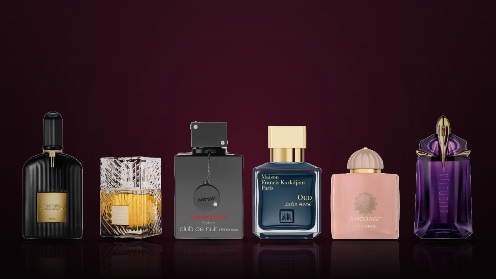 A collection of long-lasting perfume bottles for women, men and unisex wear, spanning designer, niche and Arabian fragrance houses, arranged on a dark surface