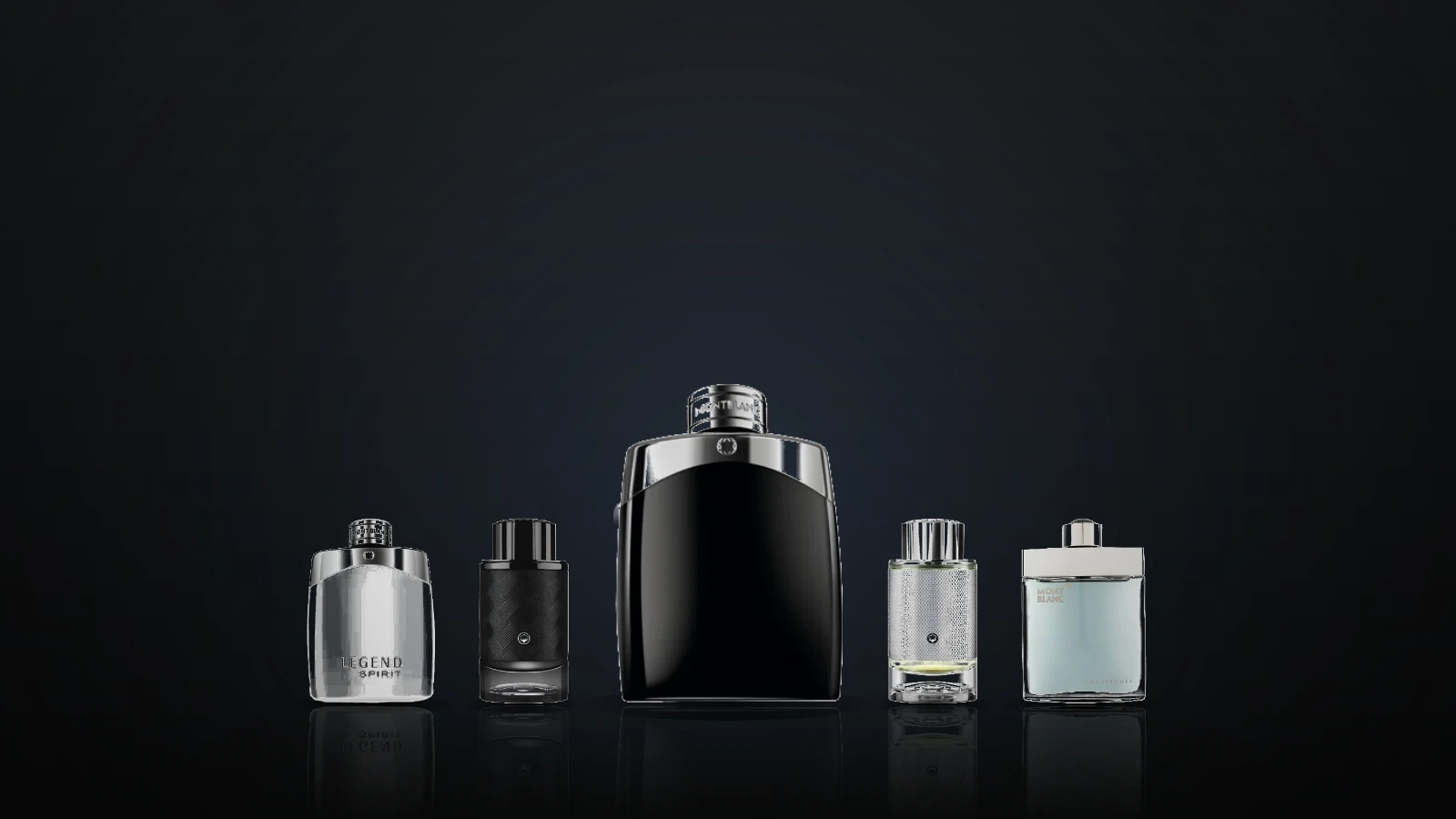 Plain generic men's fragrance bottles on a dark slate desk with brushed steel details and a leather notebook