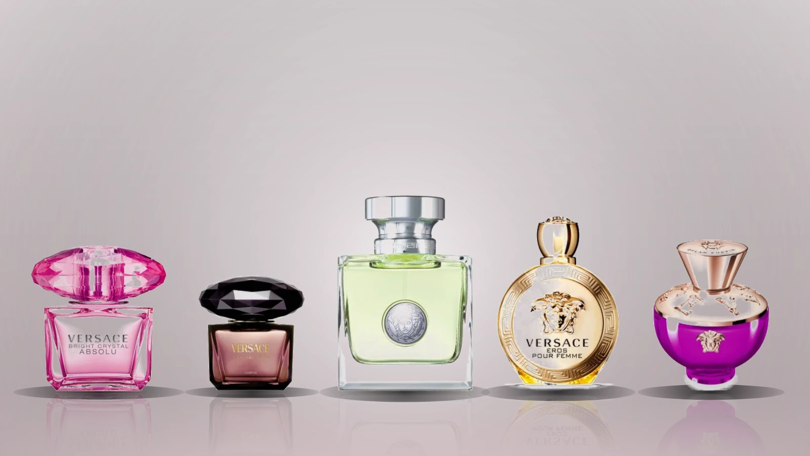 A row of plain glass perfume bottles on a sunlit Mediterranean terrace with a marble ledge and sea beyond