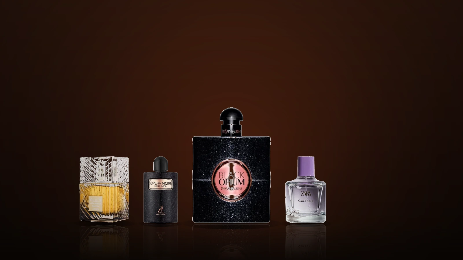 Several perfume bottles, including one labelled 'Black Opium Yves Saint Laurent,' arranged on a dark surface with coffee beans, vanilla pods, and a flower