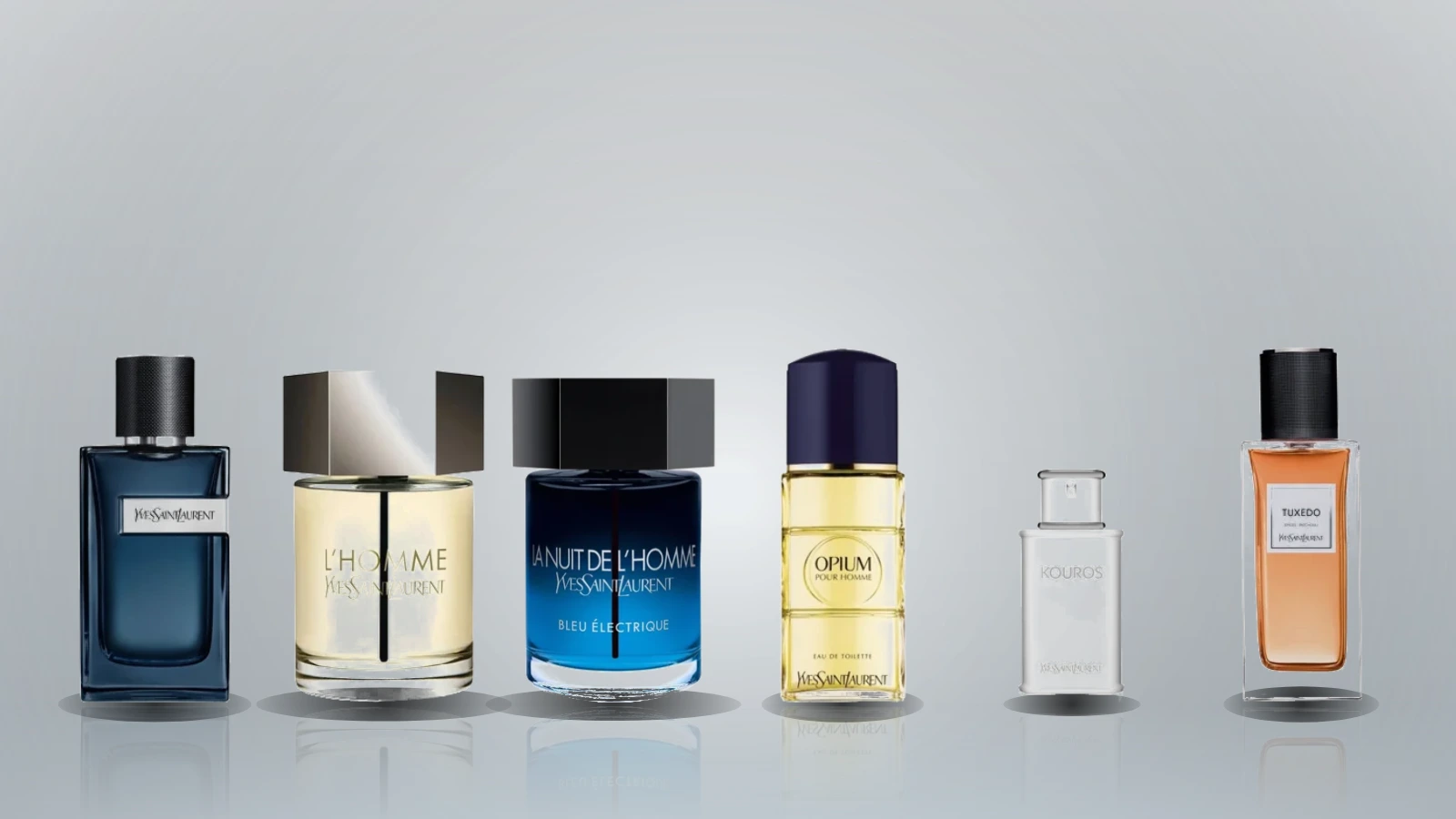 Plain glass fragrance bottles on a dark stone shelf beside a tailored jacket, in cool evening light
