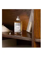 Whispers in the Library by Maison Margiela